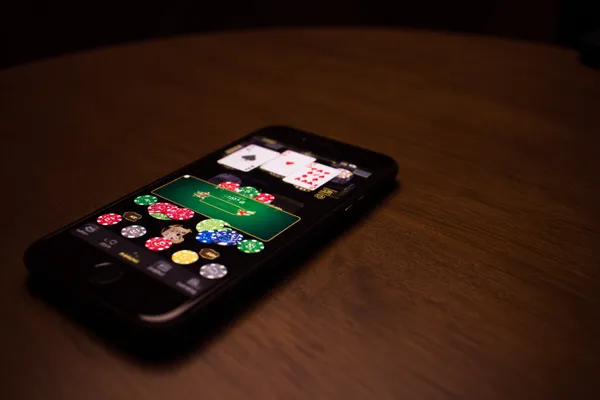 09DET Login — Instantly access your secure account A confident dealer surrounded by casino chips inviting players to access their 09DET account, reflecting quick and easy login options.